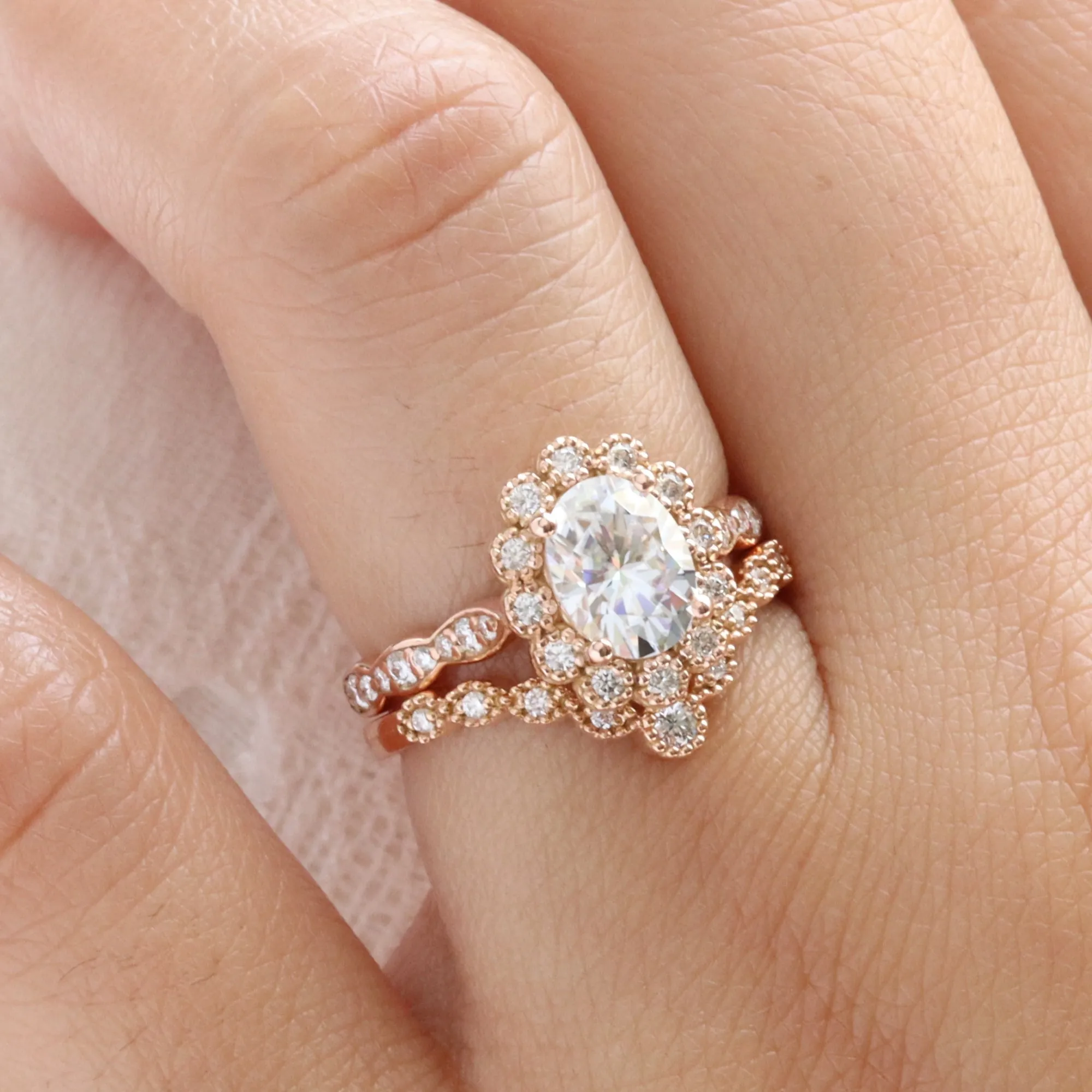 Oval Moissanite Engagement Ring in Vintage Luna Halo Diamond Ring